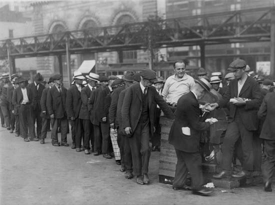 1930s Great Depression breadline New York City unemployed men waiting